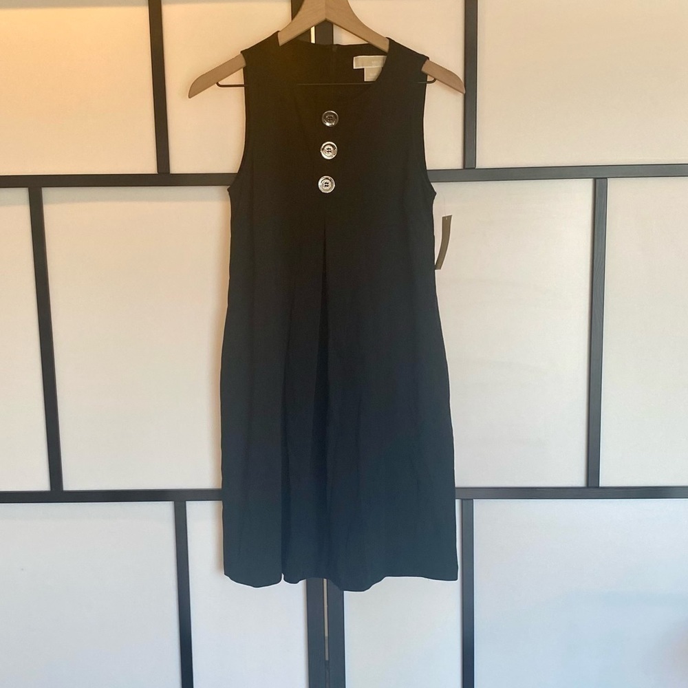 Michael Kors sleeveless black dress‎ w/silver tone buttons. Size SMALL. NWT